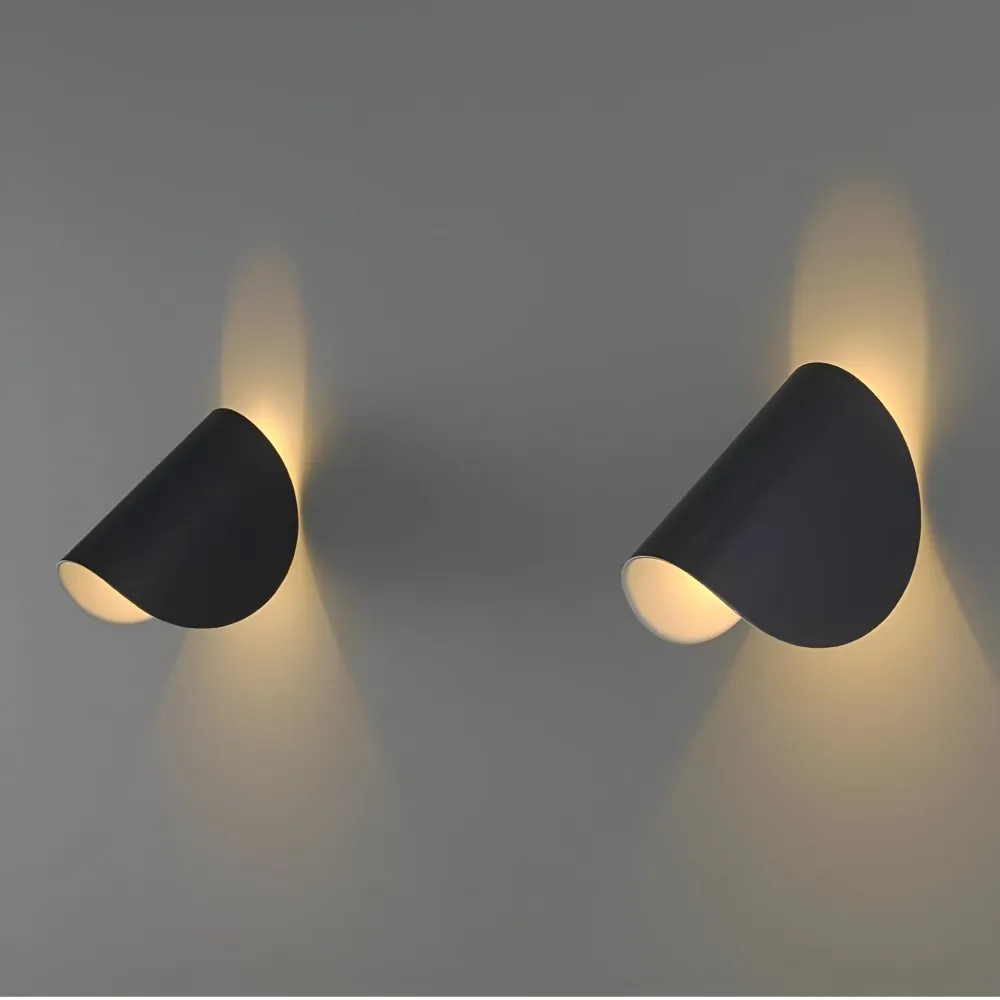 Twist – Vägglampa i Alloy med Roterande Geometrisk Design Svart