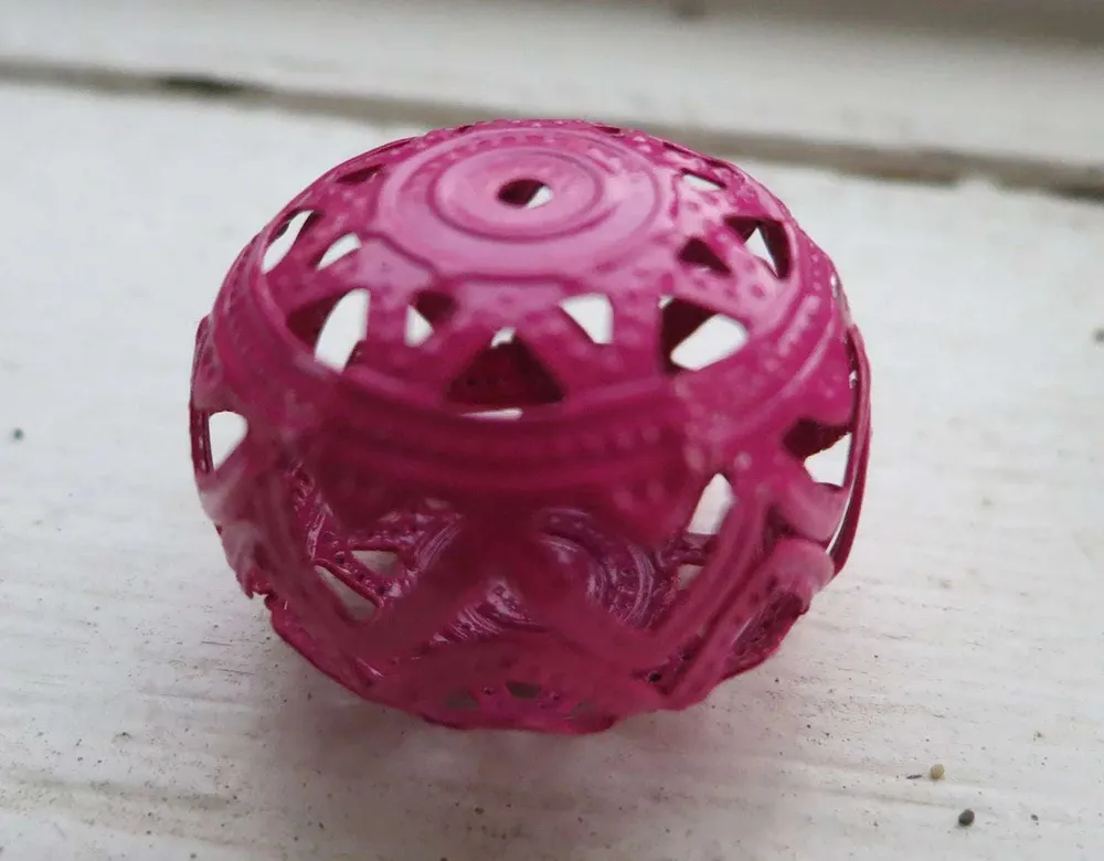 Filigree boll - Mörkrosa 26x19mm 1 styck