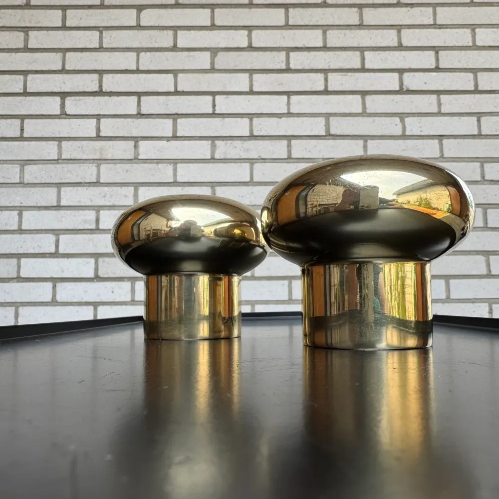 Paret ljusstakar i golden metal från Landskrona