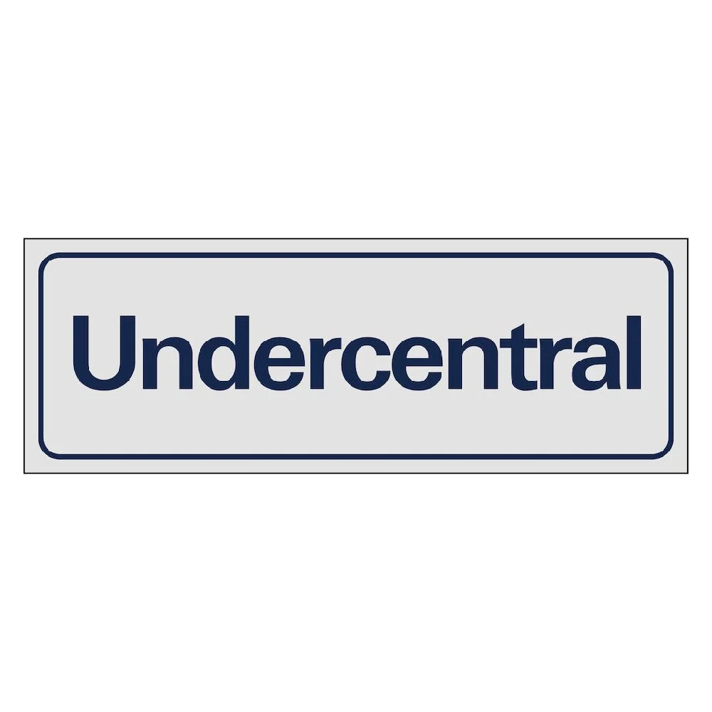 Skylt Undercentral 225x80mm