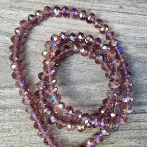Facetterade glaspärlor - Amethyst med AB-lyster, 6x4mm 1 sträng
